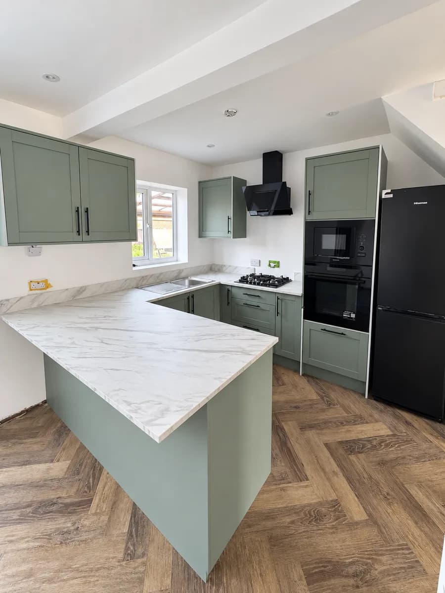 Sage kitchen with peninsula, after Kitchen3D's work