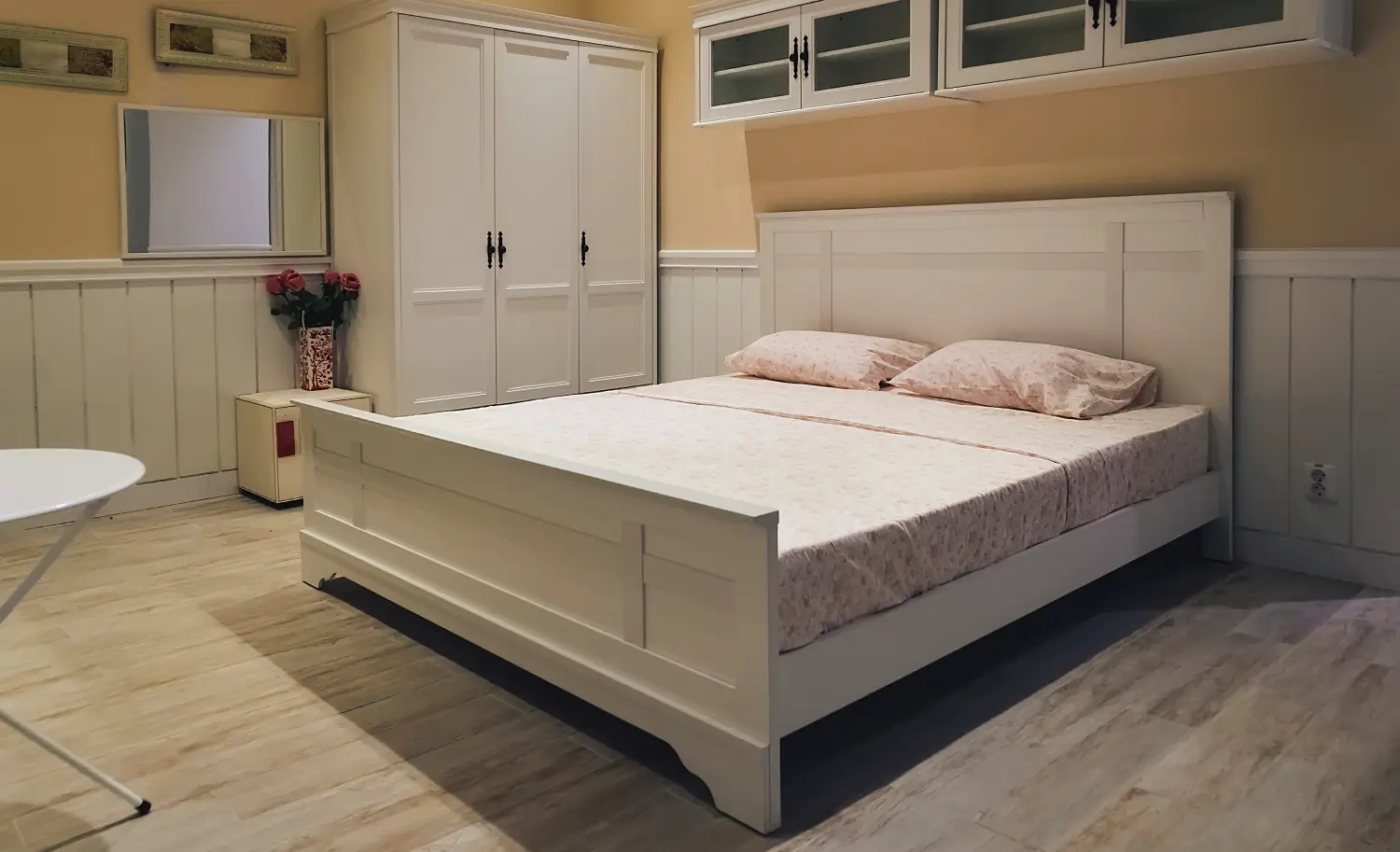 Bedroom interior with custom fitted furniture and storage